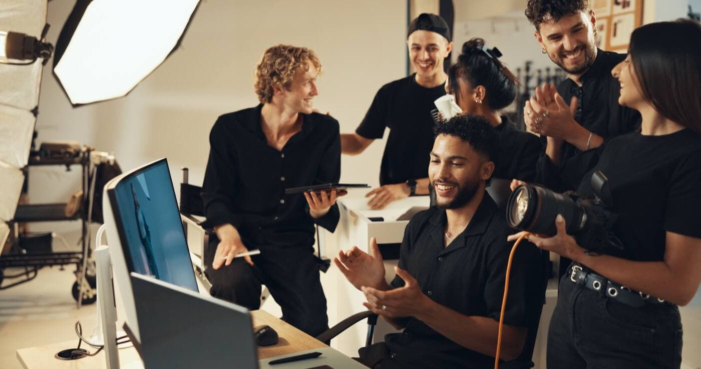 A production crew celebrating a completed shoot